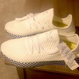 Brand new size 10 US Adidas shoes